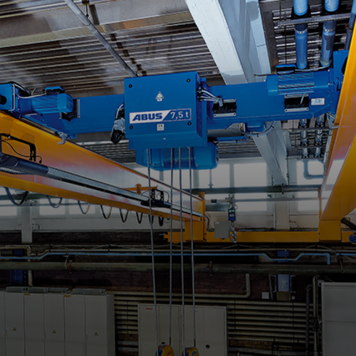 Chariot birail ABUS de type DA, conçu pour une faible hauteur d'installation et une capacité de charge allant jusqu'à 40 t dans les systèmes de ponts.